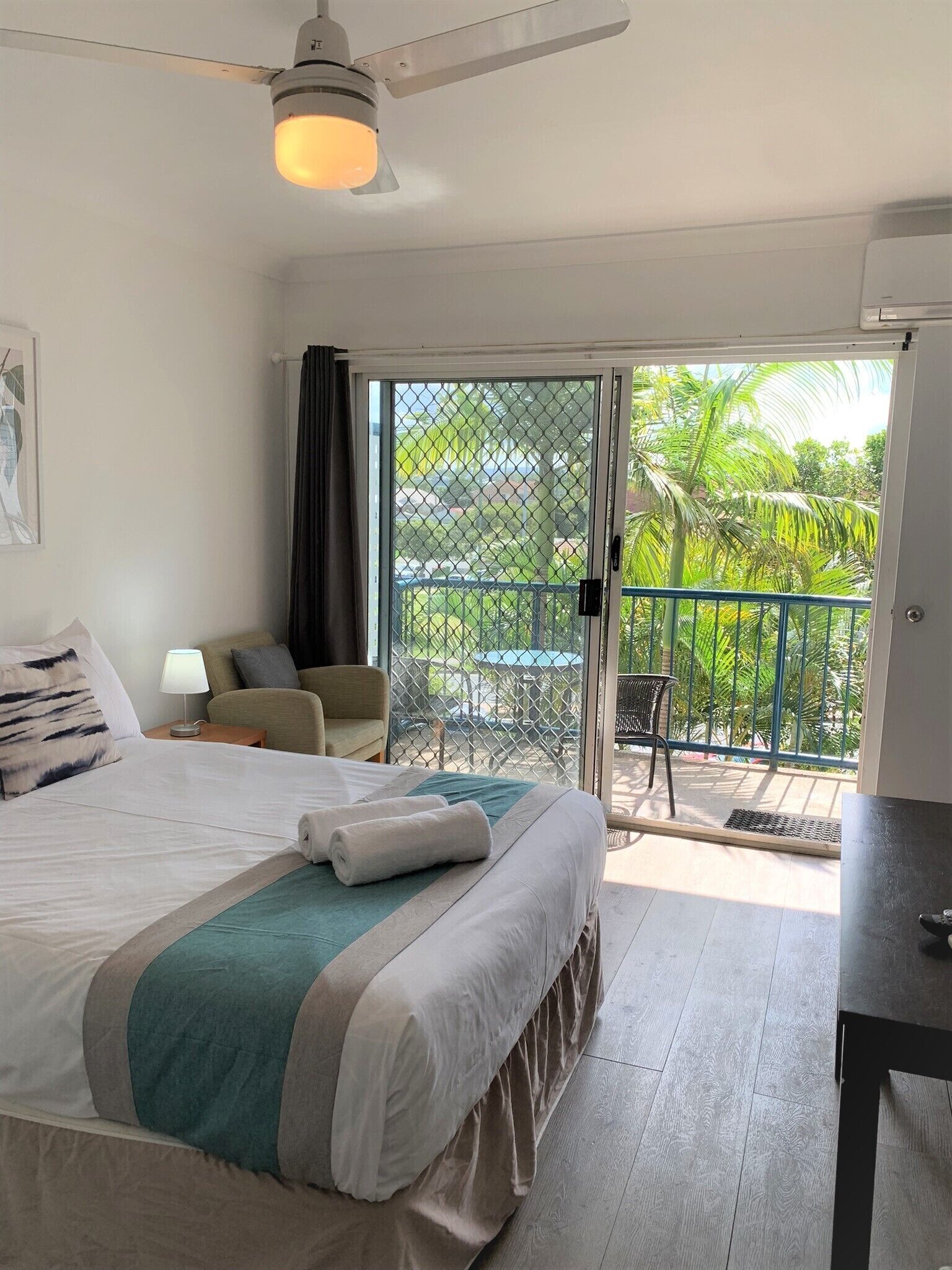 Family Studio Room, Balcony | Living area | Flat-screen TV