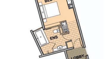 A floor plan of a hotel room with a deck, bed/unit, en-suite bathroom, lobby, and entry.
