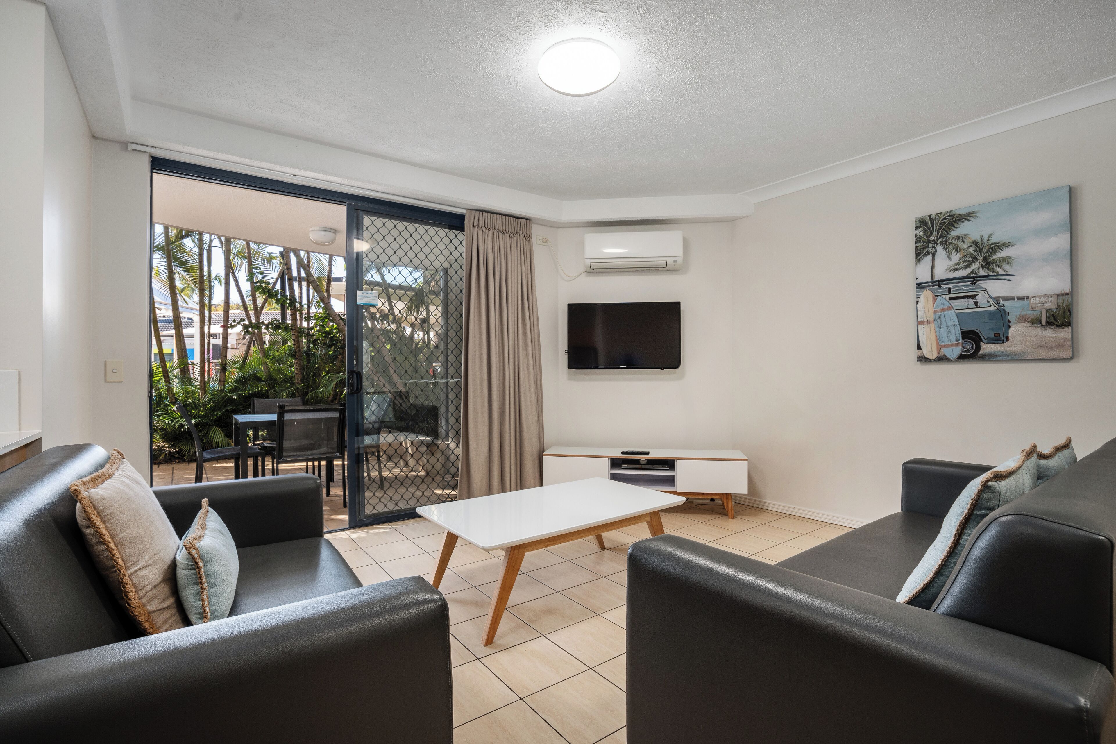 2 Bedroom Family Suite | Living area | Flat-screen TV