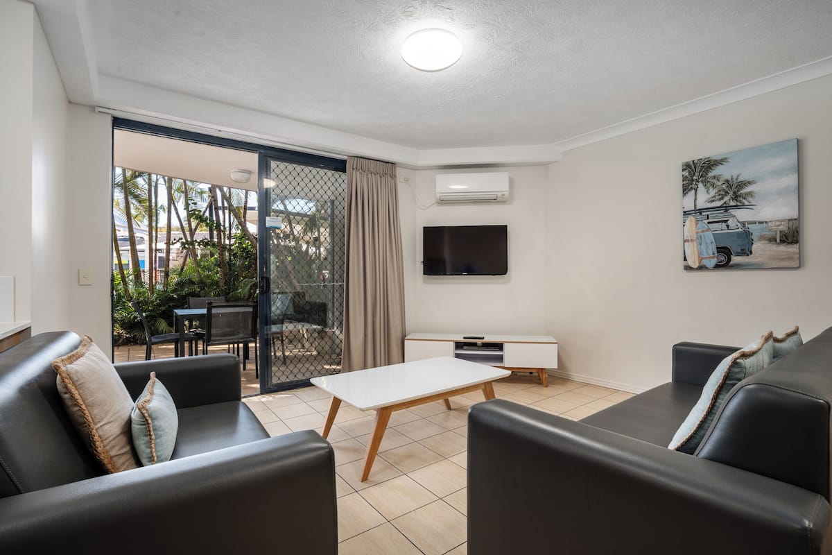 2 Bedroom Family Suite | Living area | Flat-screen TV