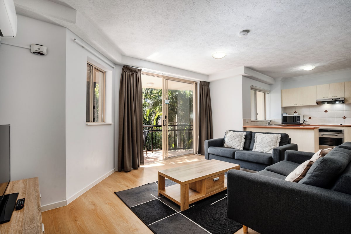 2 bedroom apartment | living area | flat-screen tv