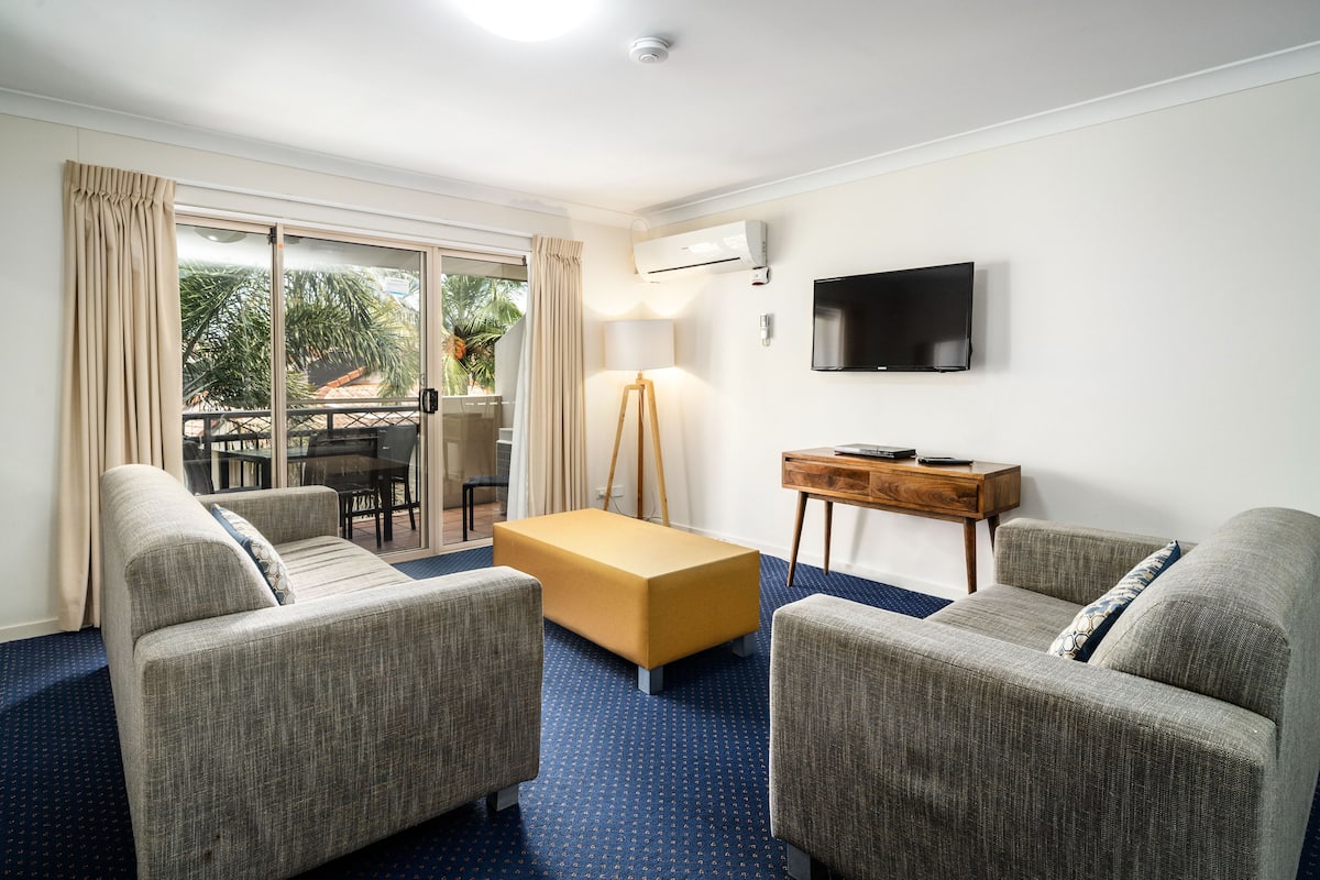 2 Bedroom Family Suite | Living area | Flat-screen TV