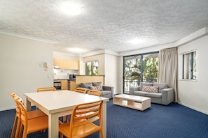 2 Bedroom Superior Apartment | Living area | Flat-screen TV