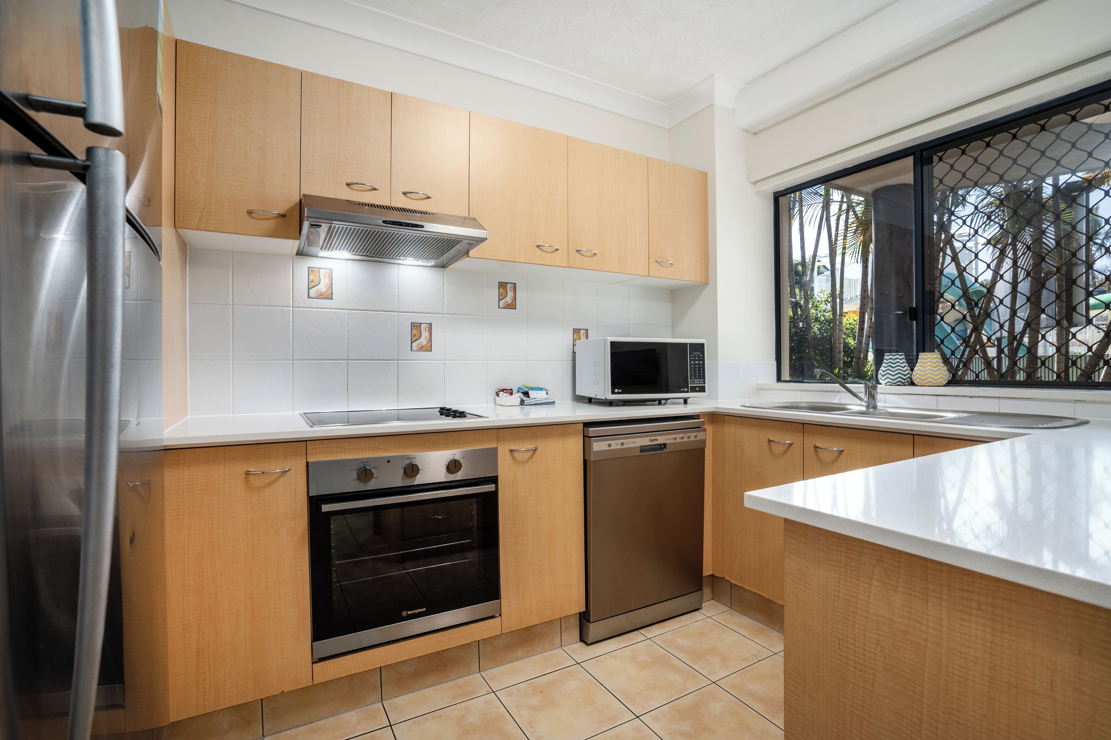 2 bedroom family suite | private kitchen | fridge, microwave, oven, stovetop