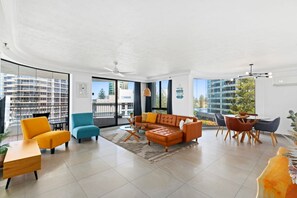 2 Bedroom Low Ocean/Garden View | Living area | 50-inch flat-screen TV with cable channels, plasma TV - Aegean Apartments (Surfers Paradise)