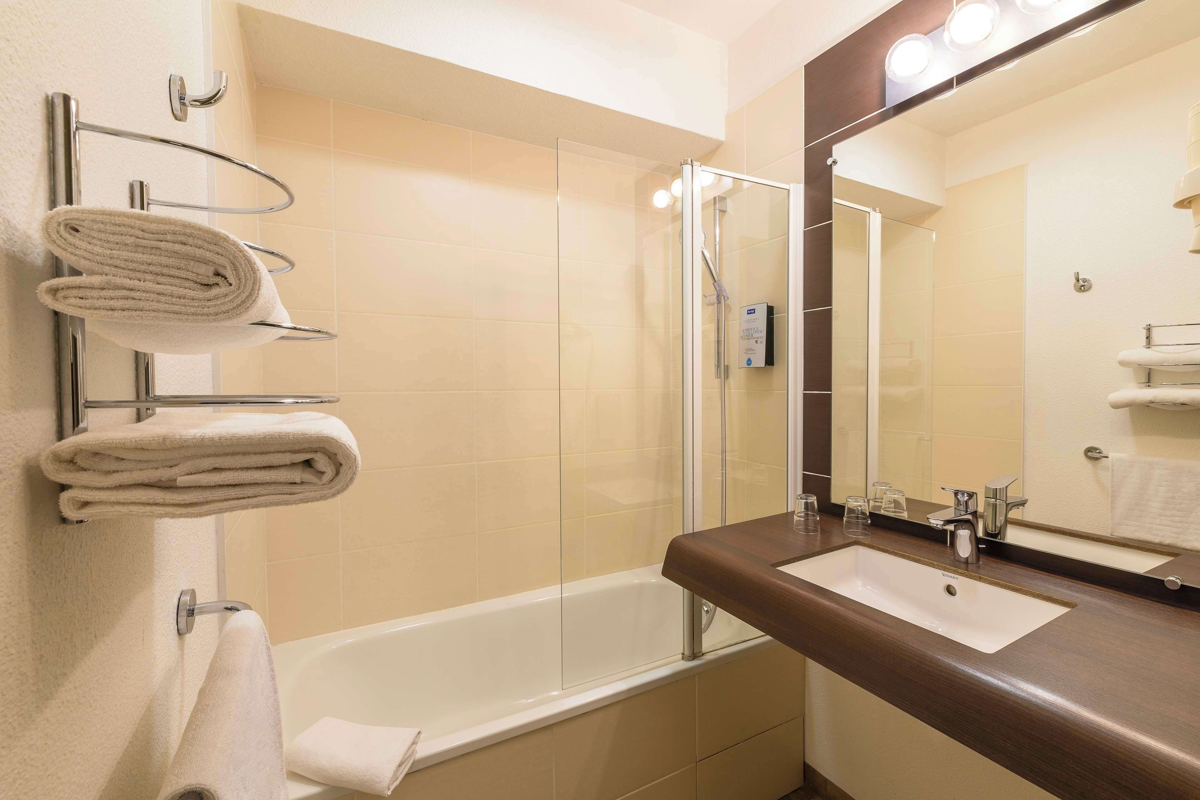 eco-friendly toiletries, hair dryer, towels, soap