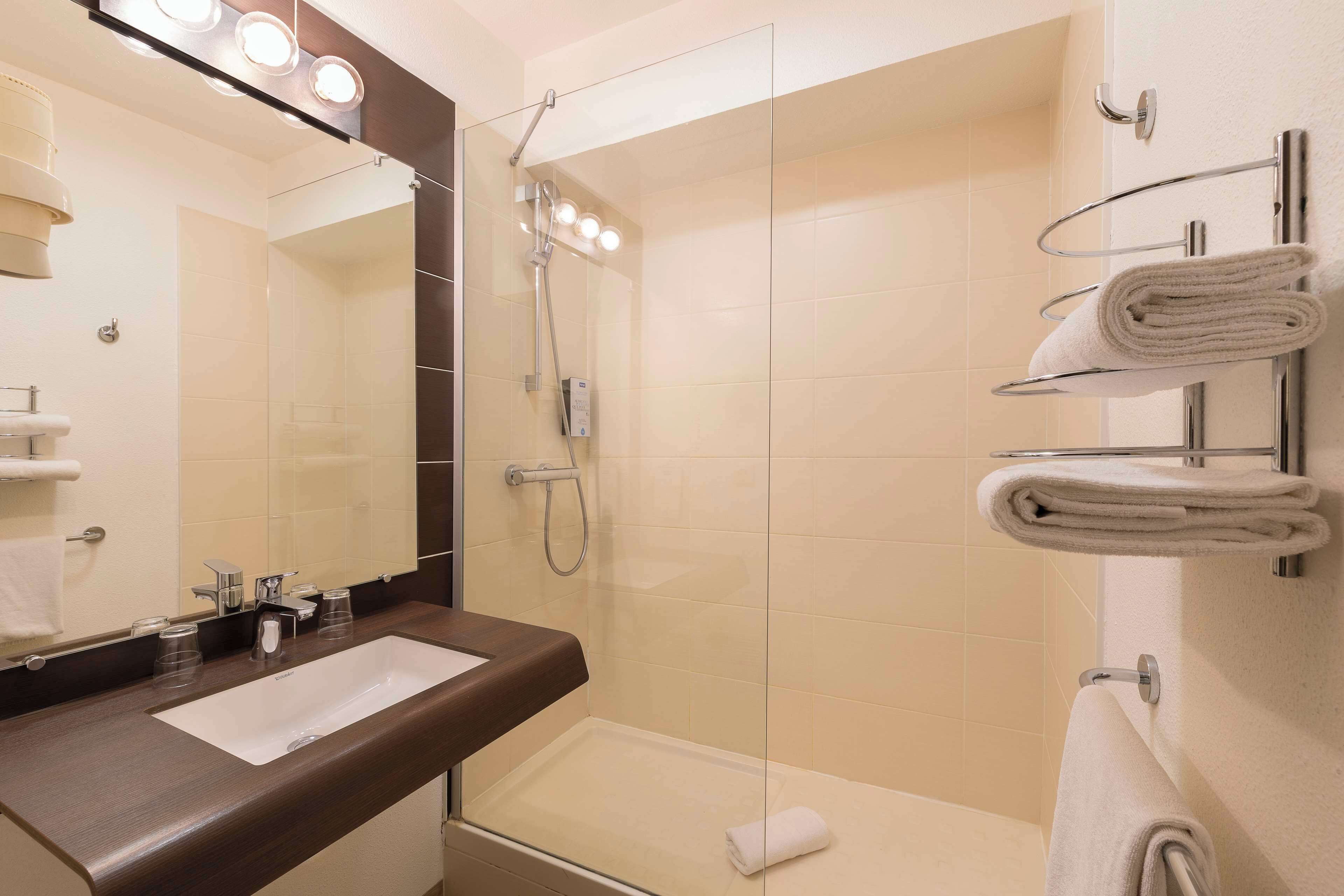 eco-friendly toiletries, hair dryer, towels, soap