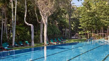 Outdoor pool, open 6 AM to 9 PM, pool umbrellas, pool loungers