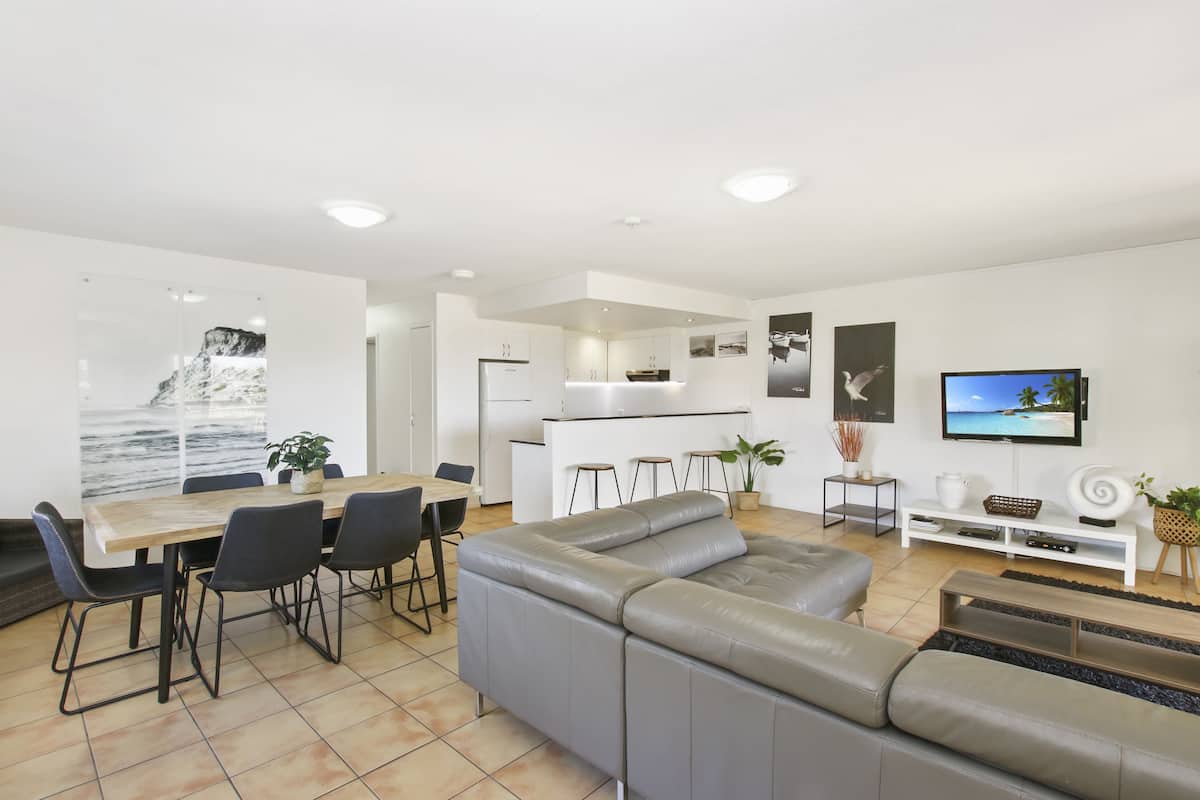 Standard Apartment, 3 Bedrooms | Living area | 1-inch LCD TV with digital channels, TV, DVD player