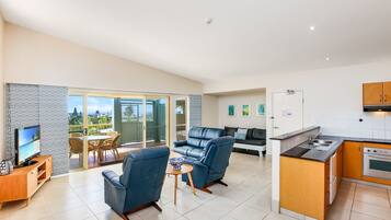 2 Bedroom Seaview Apartment | Private kitchen | Full-sized fridge, microwave, coffee/tea maker, electric kettle