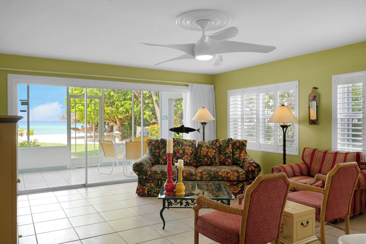 Condo 7, 2 Bedrooms, Ocean View | Living area | 32-inch TV with cable channels