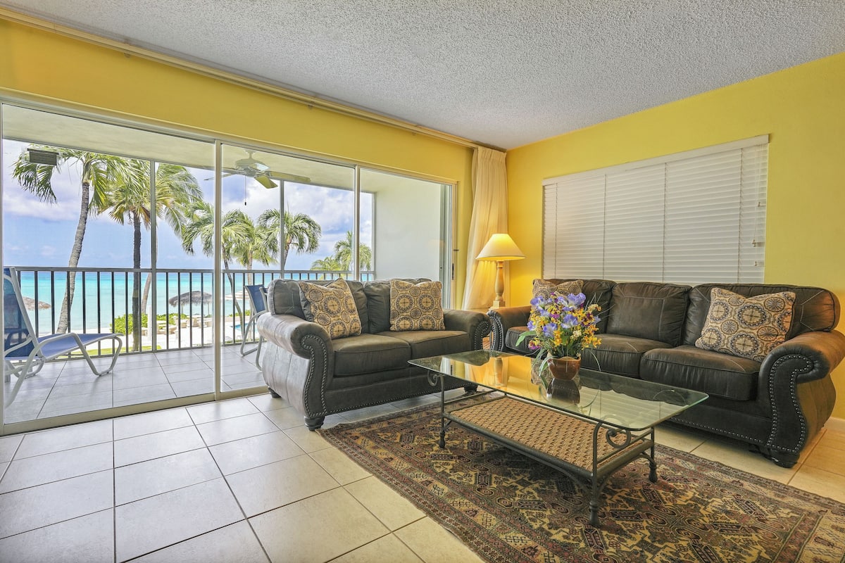 Condo 9, 2 Bedrooms, Ocean View | Living area | 32-inch TV with cable channels