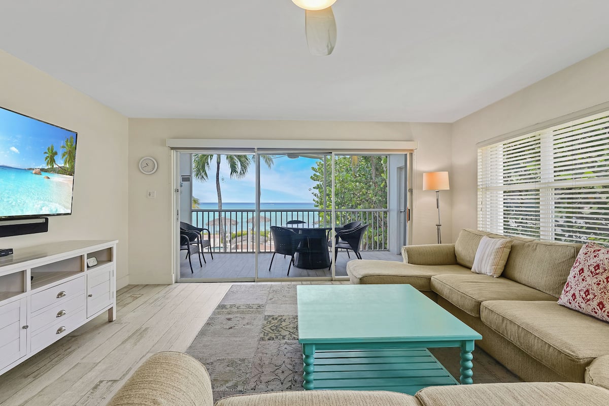 Condo 15, 2 Bedrooms, Ocean View | Living area | 32-inch TV with cable channels