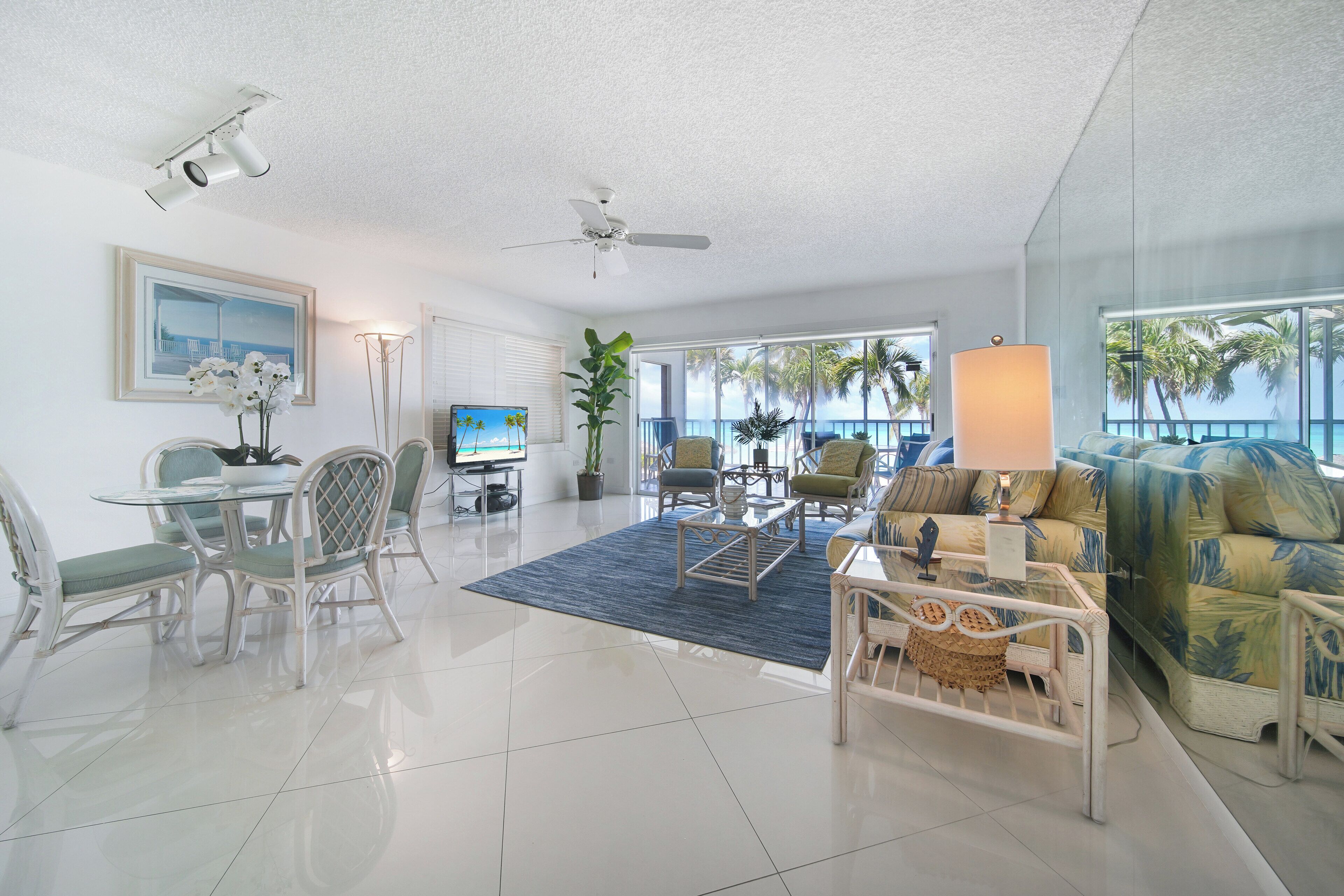 Condo 10, 2 Bedrooms, Ocean View | Living area | 32-inch TV with cable channels
