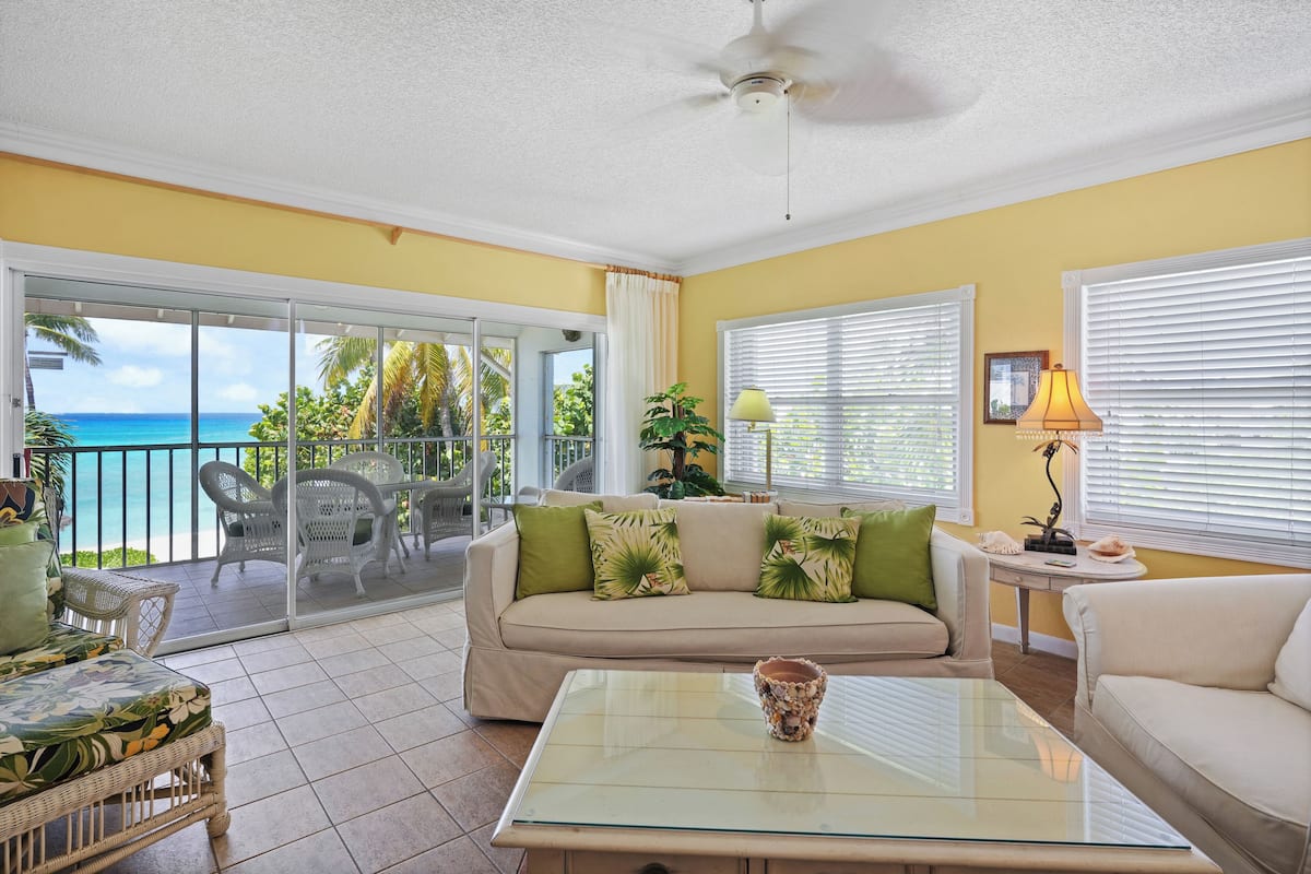 Condo 22, 2 Bedrooms, Ocean View | Living area | 32-inch TV with cable channels