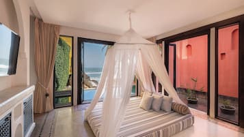 One Bedroom Morocccan Beachfront Pool | Living area | 32-inch Smart TV with digital channels, TV