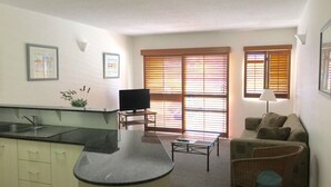 City Apartment, 1 Bedroom | Living area - Inn Cairns Boutique Apartments (Cairns)