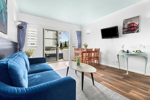 Business Apartment, 1 Bedroom | Living area | Flat-screen TV