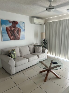 Deluxe One Bedroom Apartment | Living area | 40-inch flat-screen TV with digital channels, TV - Beachside Mooloolaba (Mooloolaba)