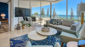 Two Bedroom Suite with Ocean View | Living area | 50-inch TV with satellite channels