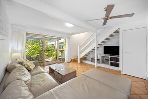 Two Bedroom Villa Poolside | Living area | 50-inch Smart TV with digital channels, TV, Netflix - The Islander Noosa Resort (Noosaville)