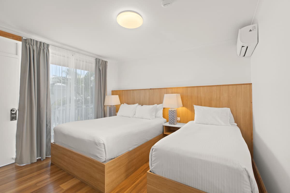 courtyard twin (separate building - no lift access) | 1 bedroom, desk, blackout curtains, iron/ironing board