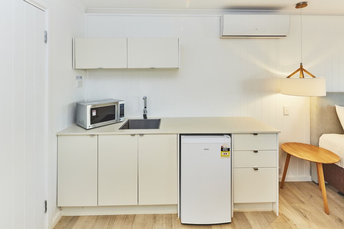 superior beach view room | private kitchenette | fridge, microwave