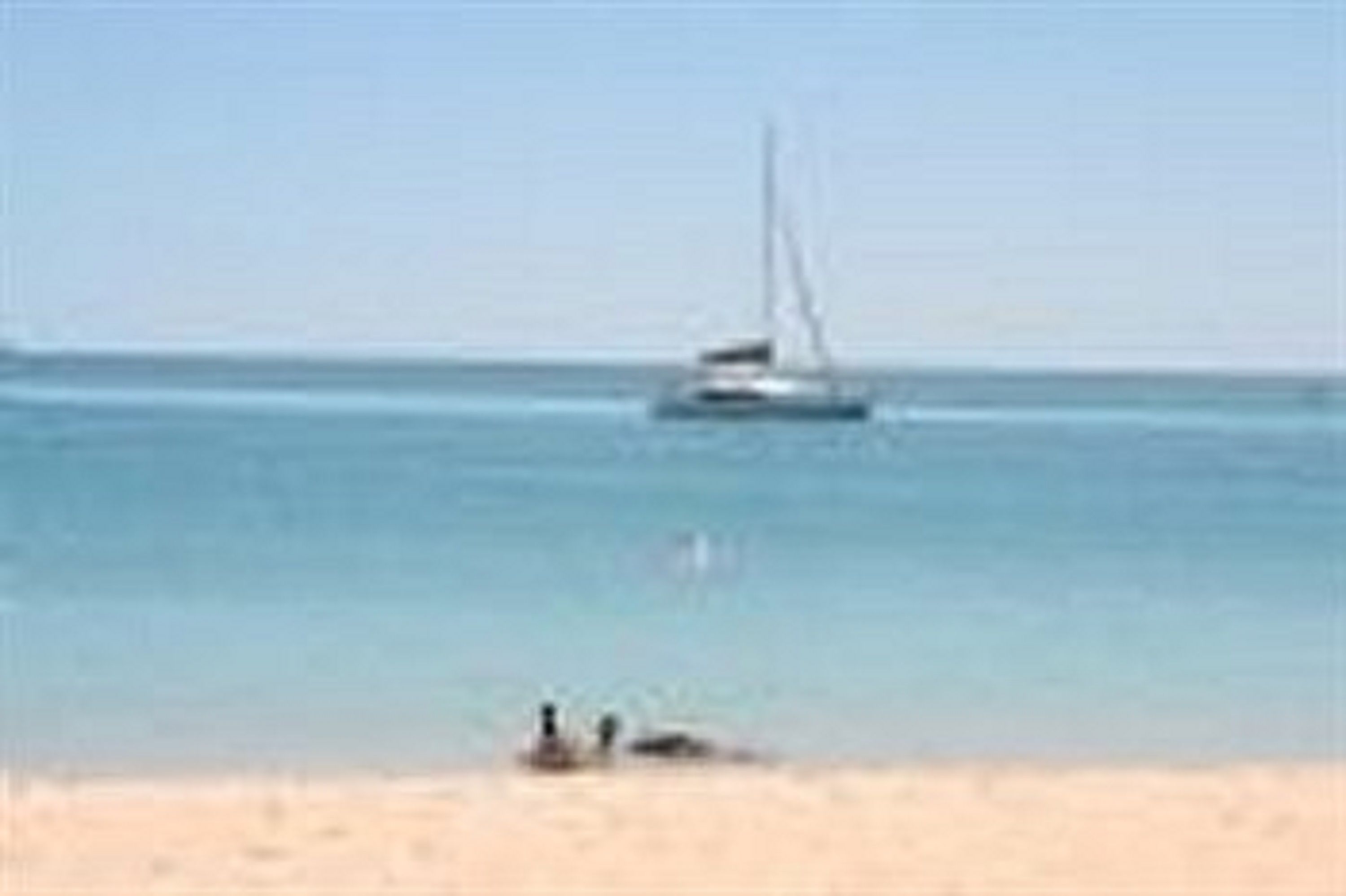 on the beach, beach towels, snorkelling, kayaking