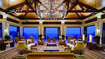 4 bars/lounges, poolside bar, beach bar