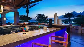 4 bars/lounges, poolside bar, beach bar