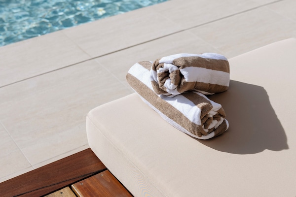 Outdoor pool, open 8:00 AM to 8:00 PM, free cabanas, pool umbrellas