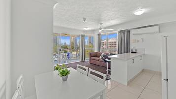 1 Bedroom Ocean View Spa Apartment | Living area | 100-cm flat-screen TV with digital channels, TV