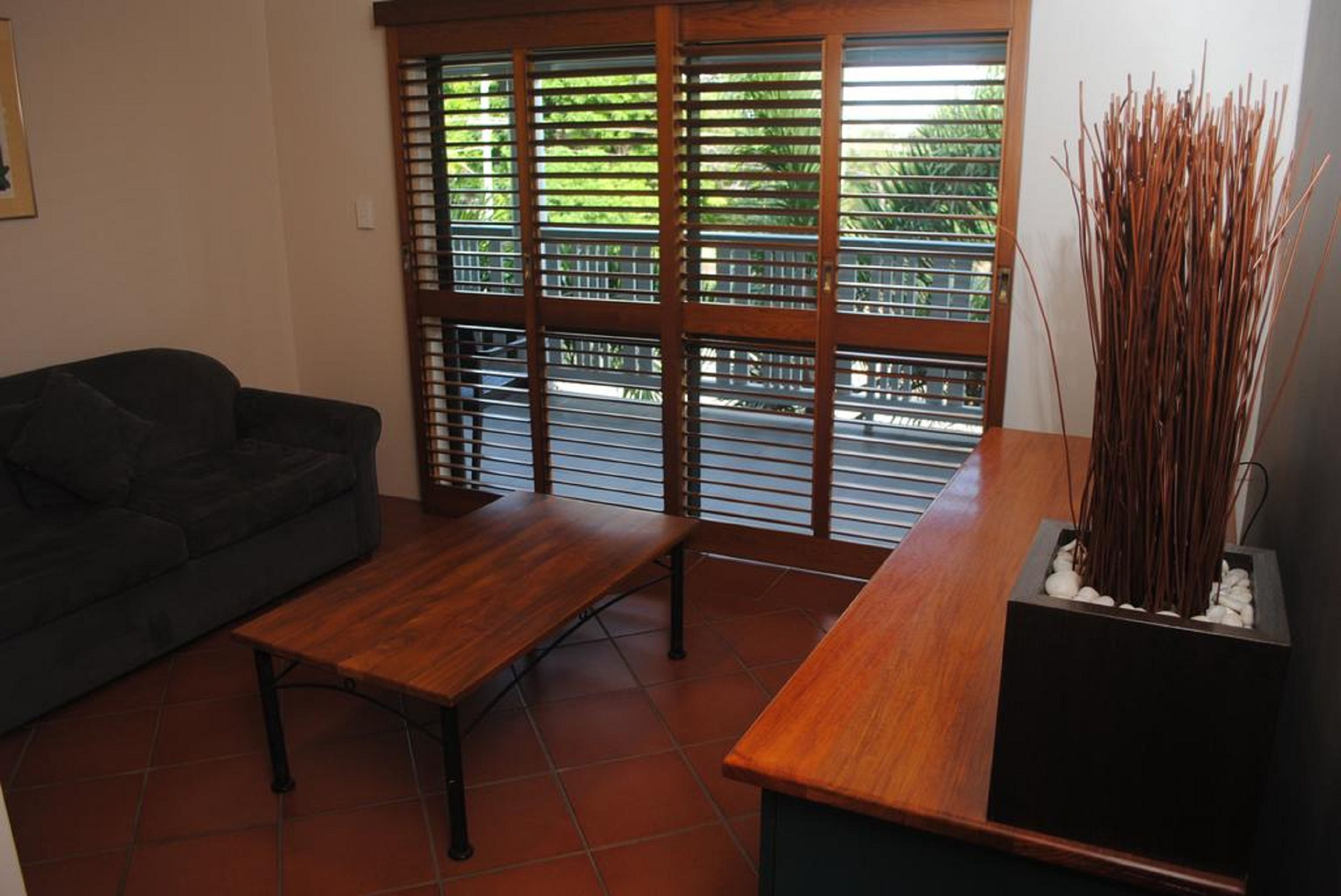 deluxe resort room  | living room | flat-screen tv