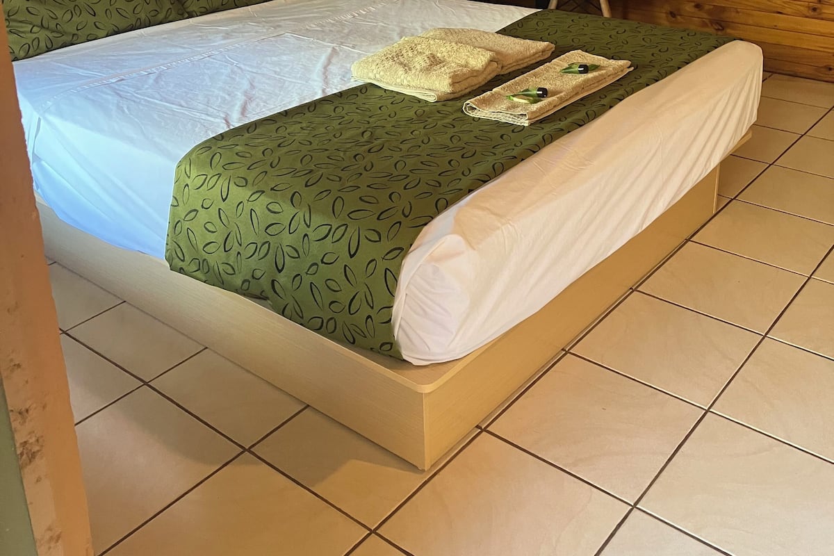 Individually furnished, desk, laptop workspace, bed sheets