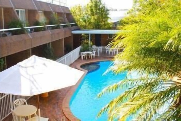 Outdoor pool, pool umbrellas, sun loungers