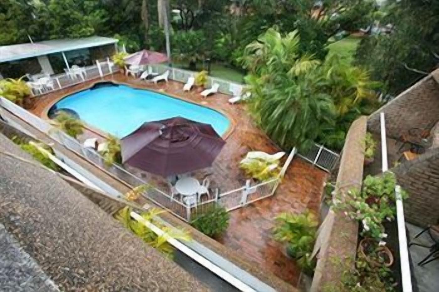 outdoor pool, pool umbrellas, pool loungers