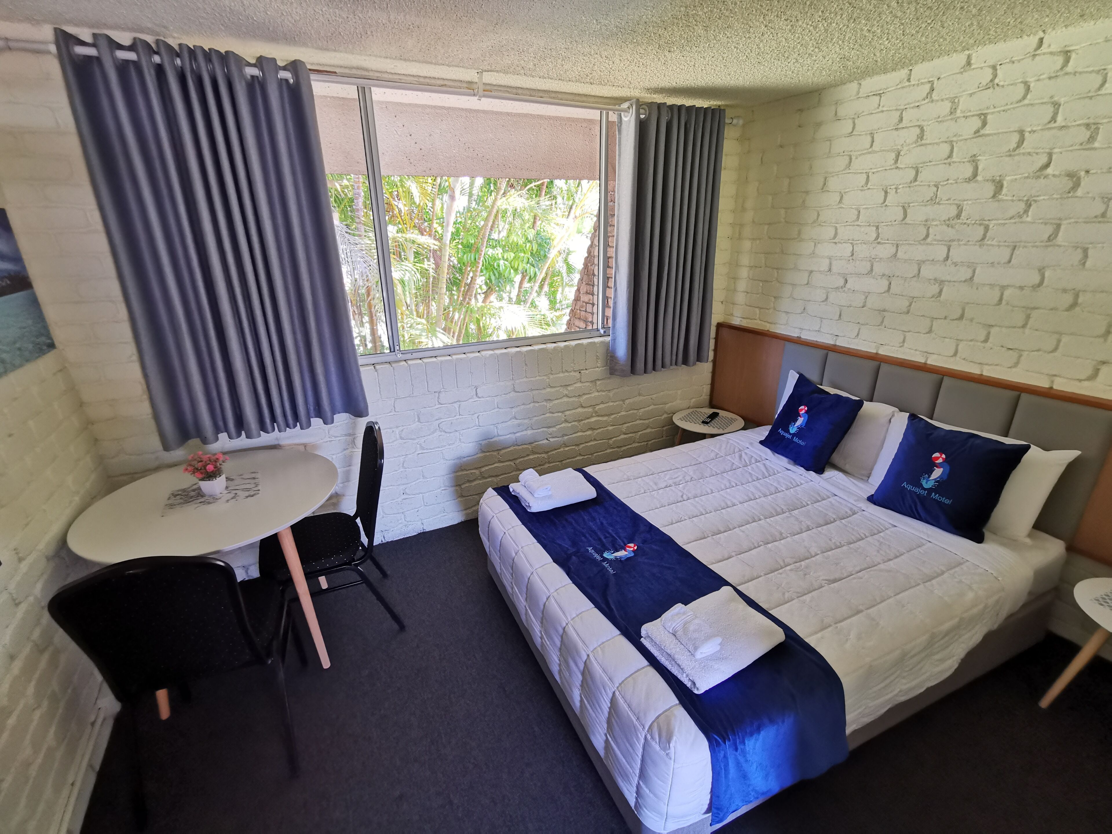 Premium bedding, desk, blackout drapes, iron/ironing board