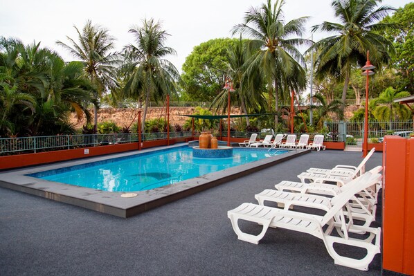 Outdoor pool, open 8:00 AM to 9:00 PM, pool loungers