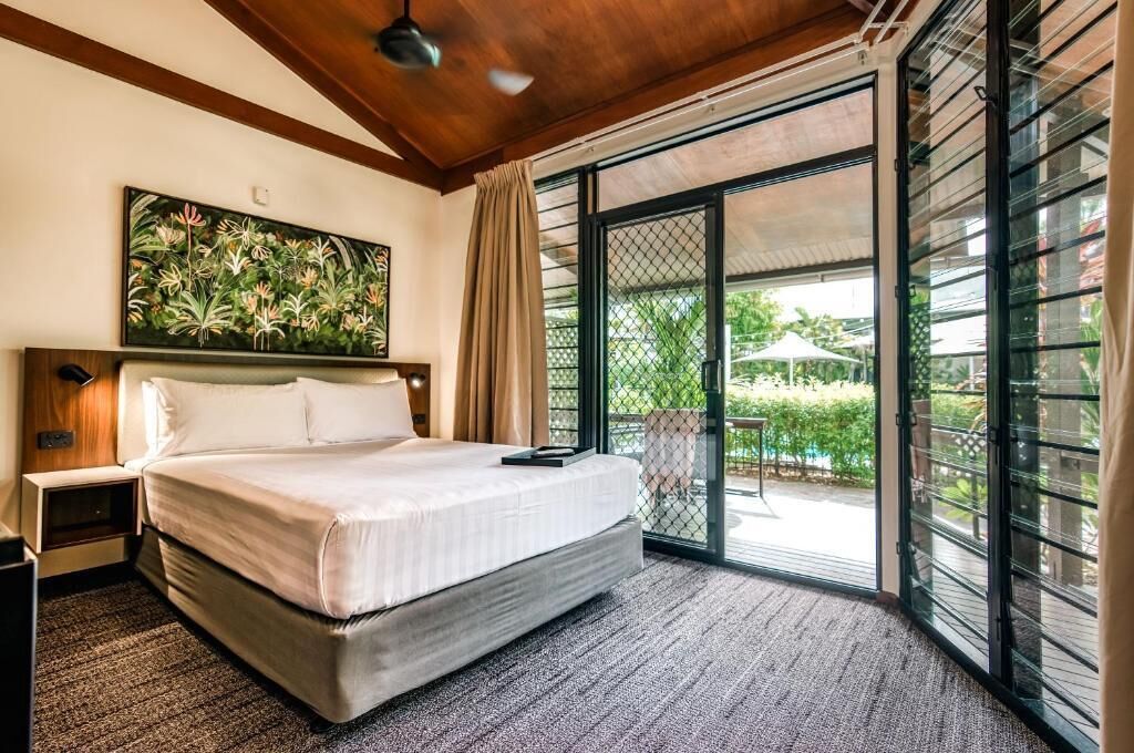 Premium bedding, desk, laptop workspace, iron/ironing board