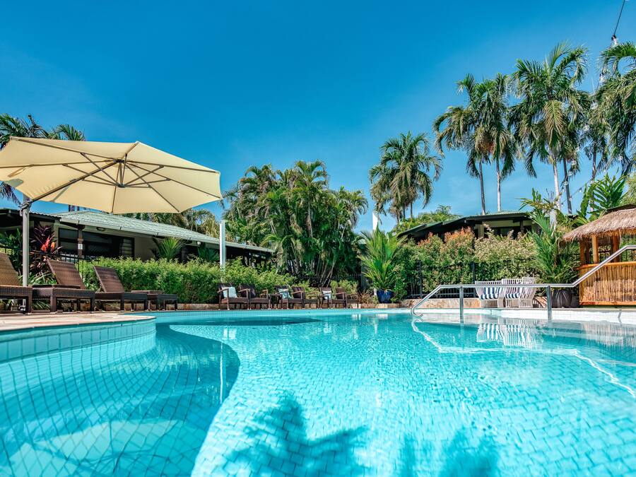 Outdoor pool, open 6 AM to 10 PM, pool umbrellas, sun loungers