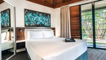 Premium bedding, desk, laptop workspace, iron/ironing board