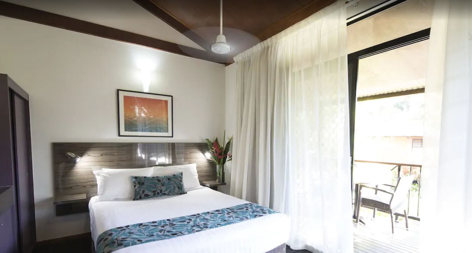 Premium bedding, desk, laptop workspace, iron/ironing board