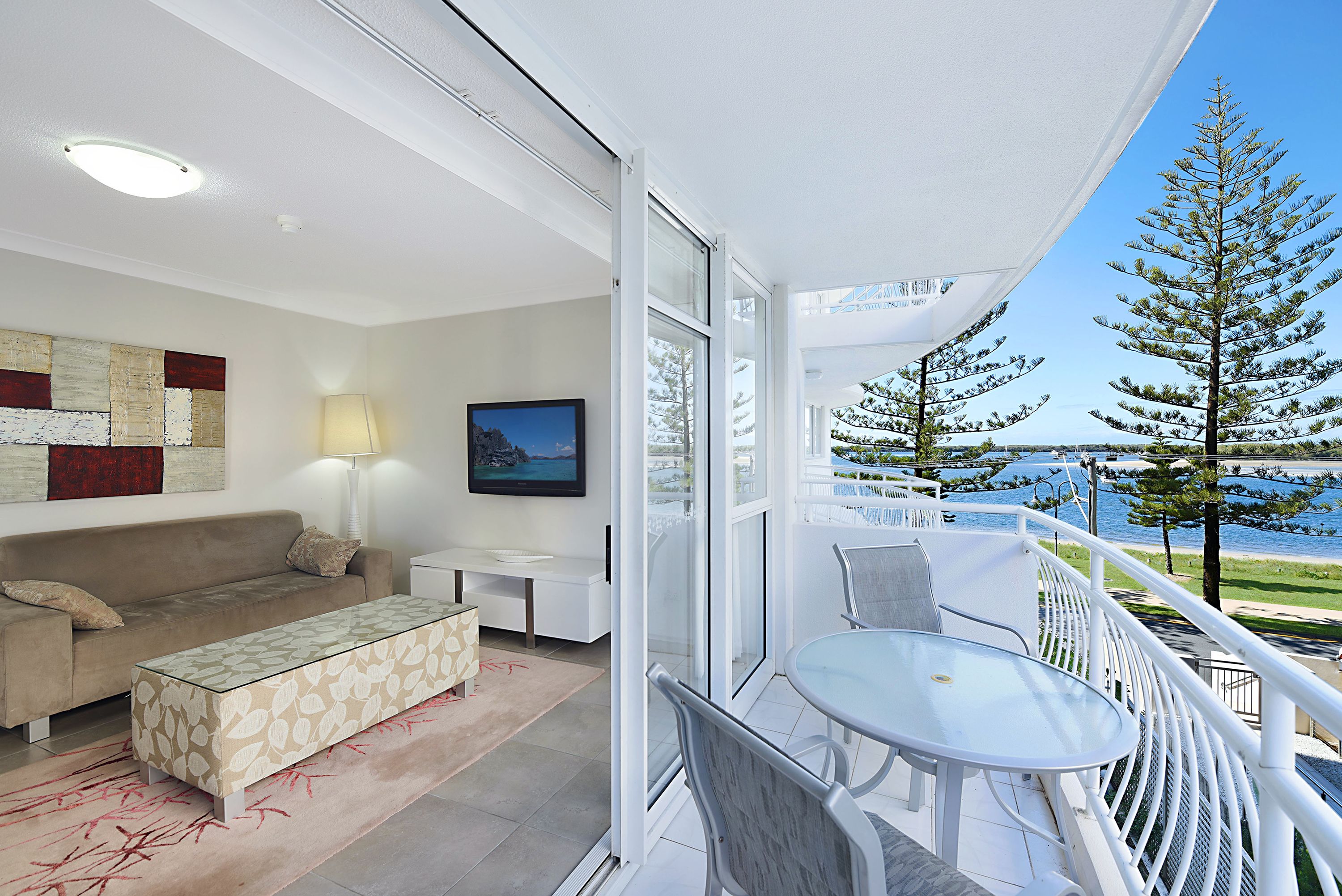 2 bedroom spa apartment | living area | flat-screen tv