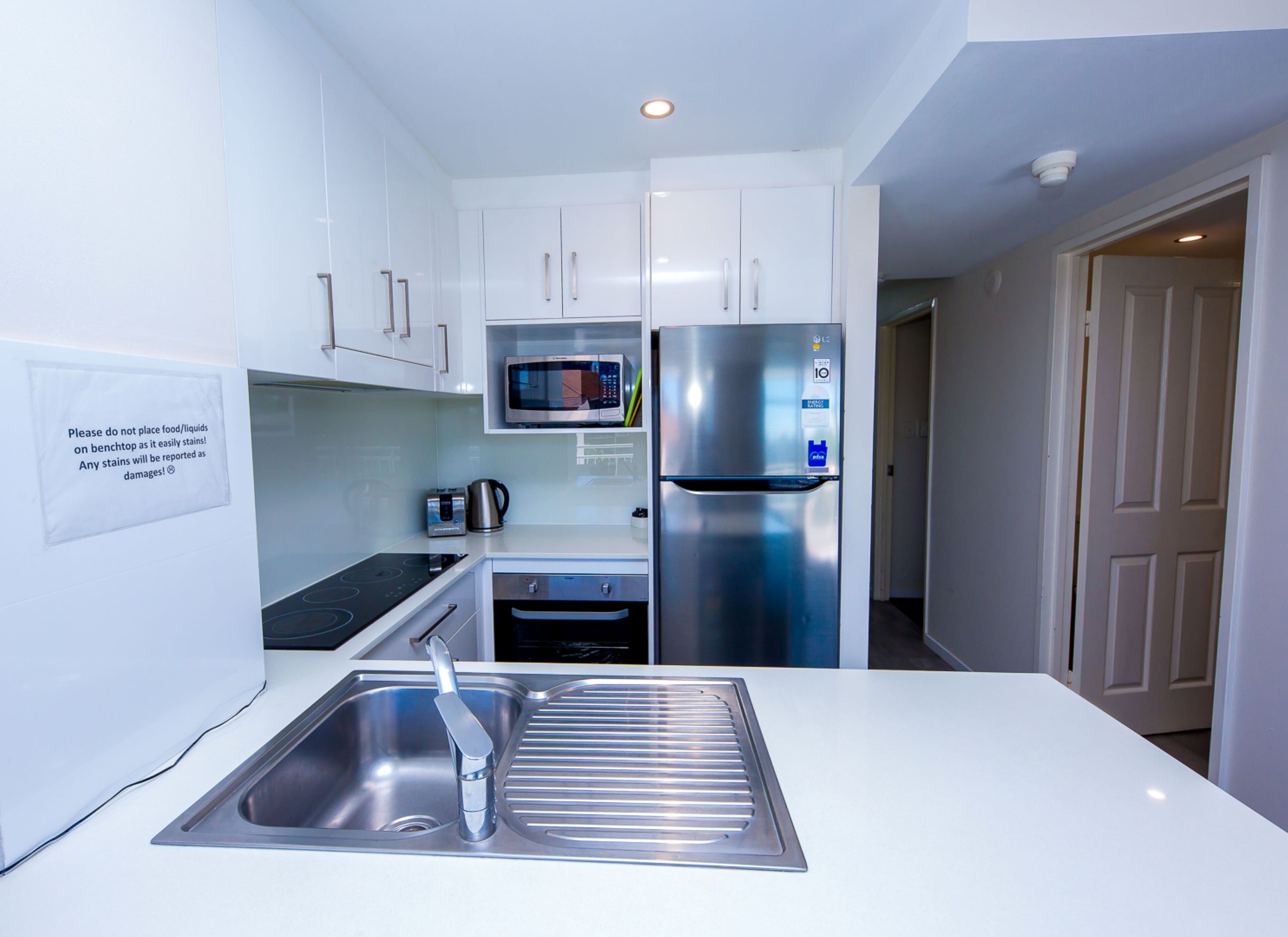 2 bedroom spa deluxe | private kitchen | fridge, microwave, stovetop, dishwasher