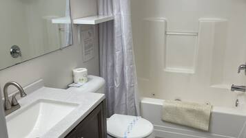 1 King Bed | Bathroom | Free toiletries, hair dryer, towels