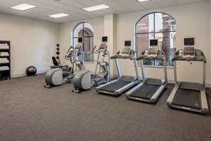 A fitness center with treadmills, elliptical machines, and a stationary bike. - Courtyard by Marriott San Antonio SeaWorld - Westover Hills (San Antonio)