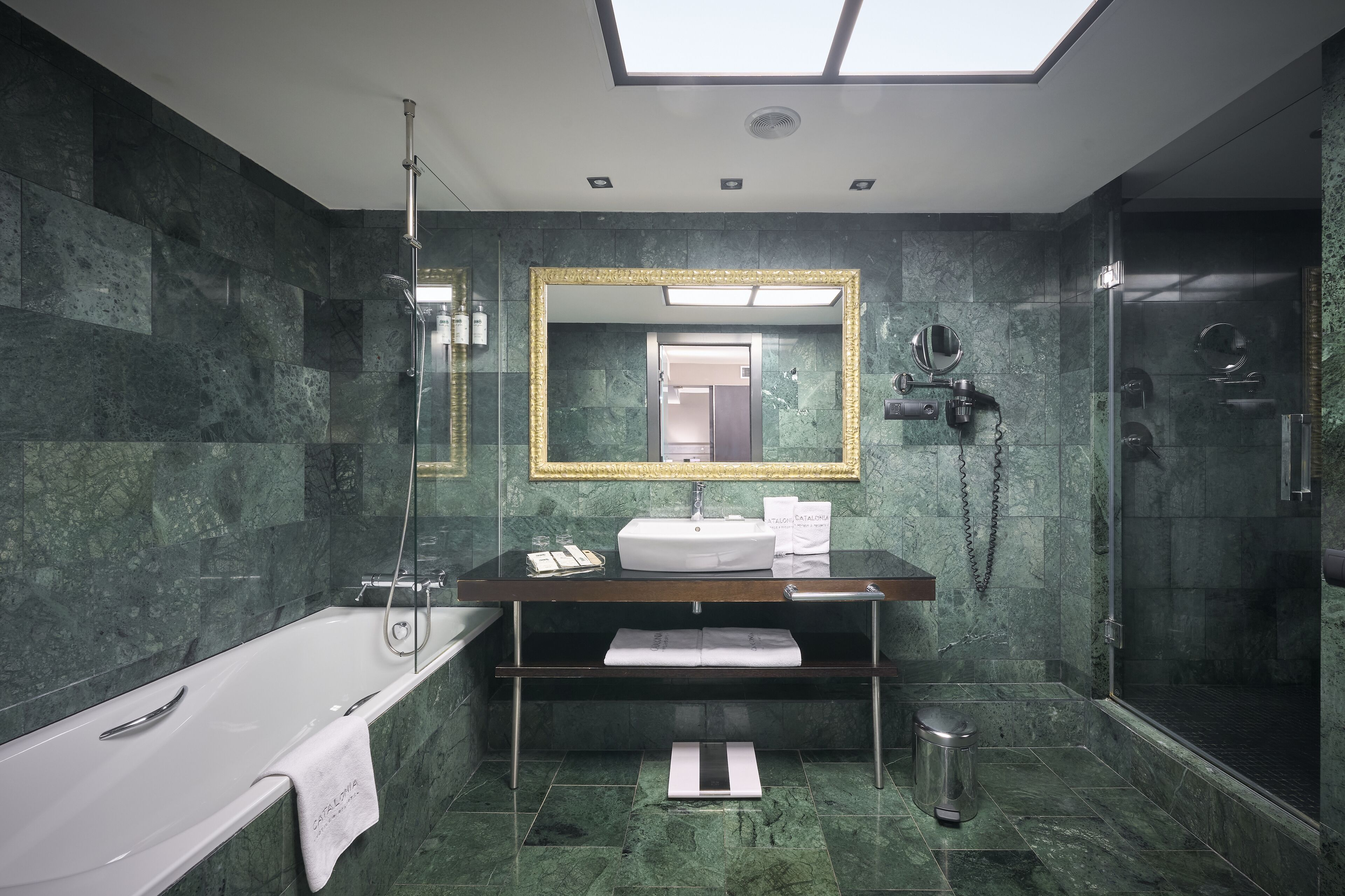 eco-friendly toiletries, hair dryer, towels