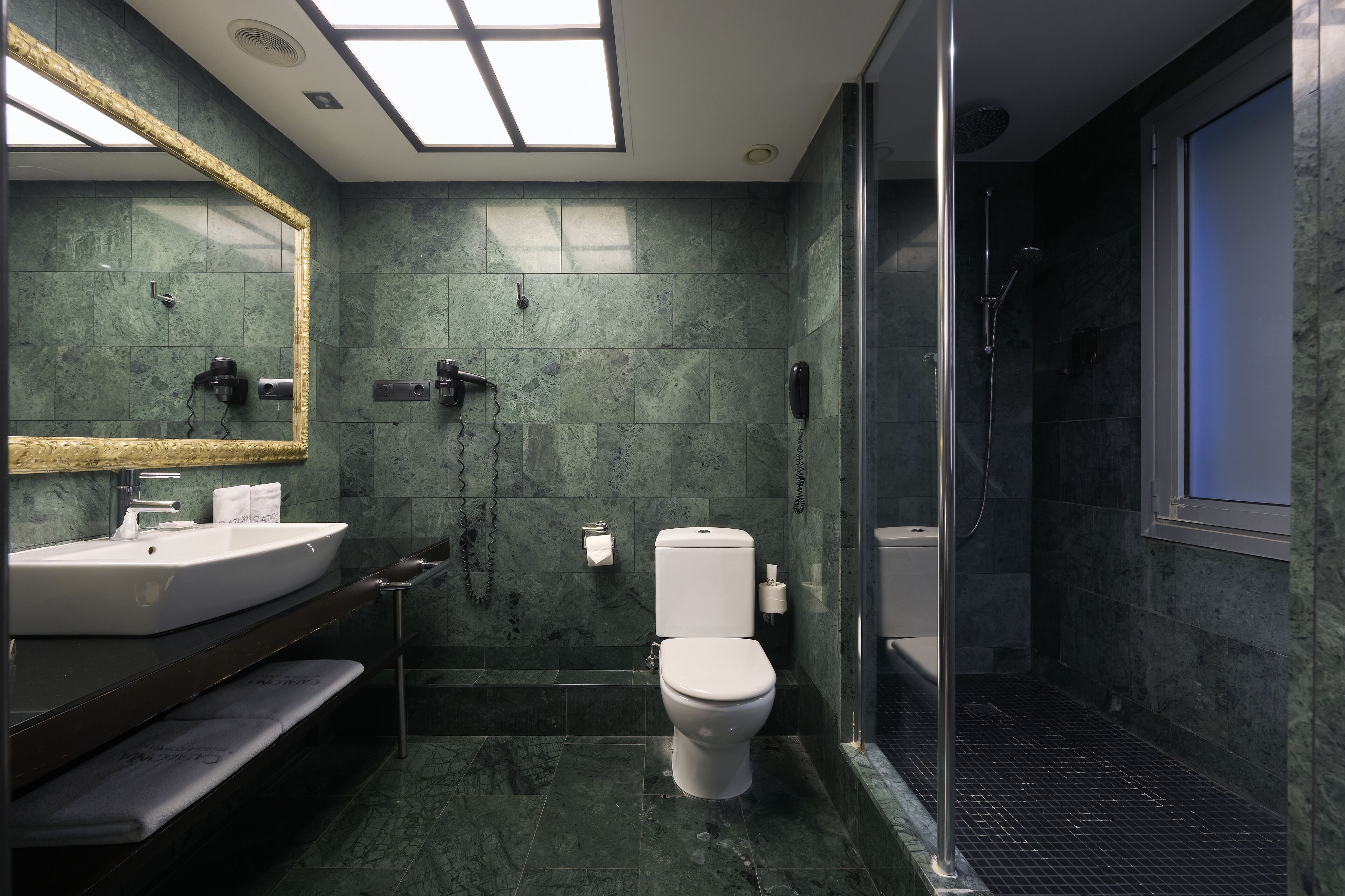 eco-friendly toiletries, hair dryer, towels