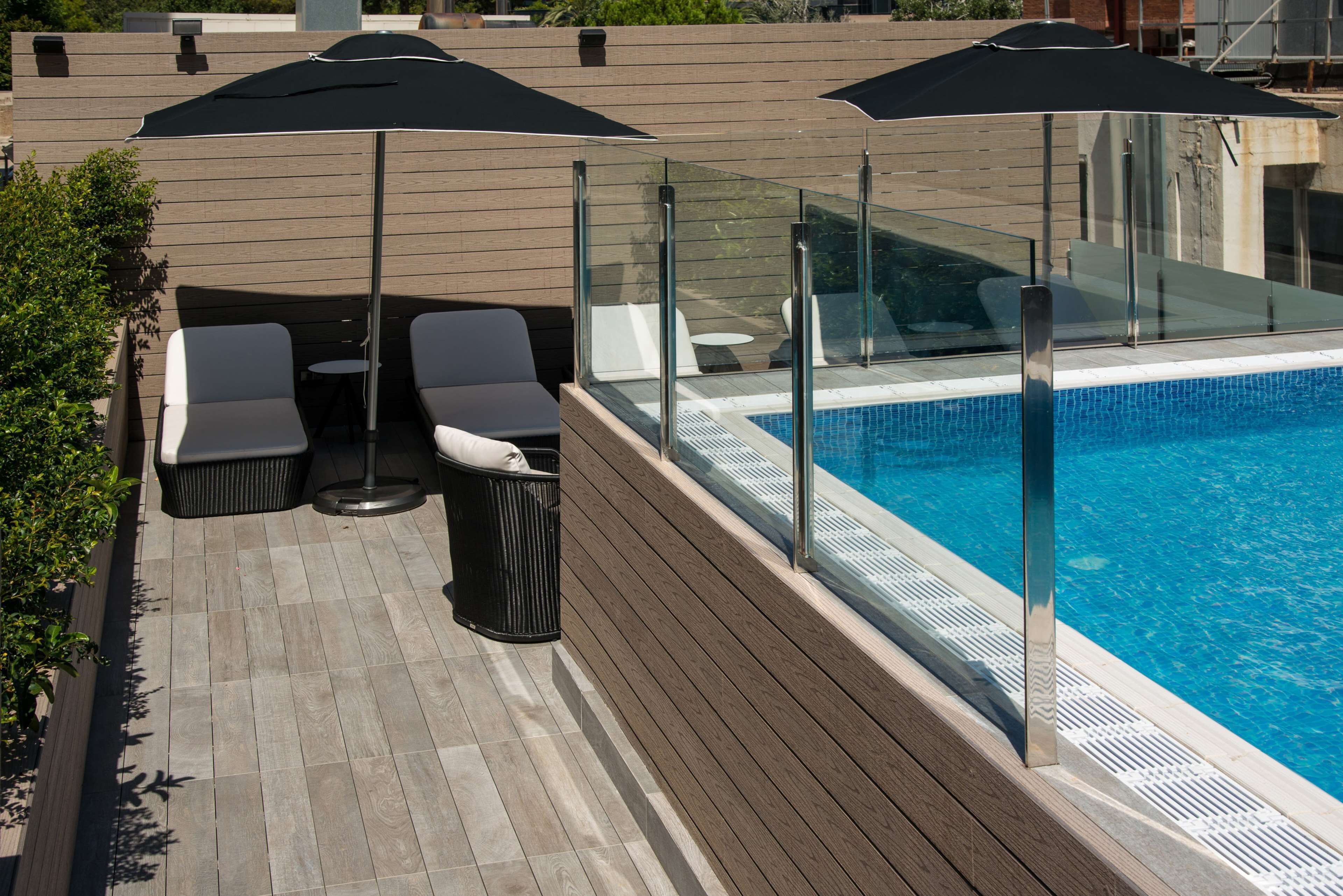 seasonal outdoor pool, pool umbrellas, pool loungers