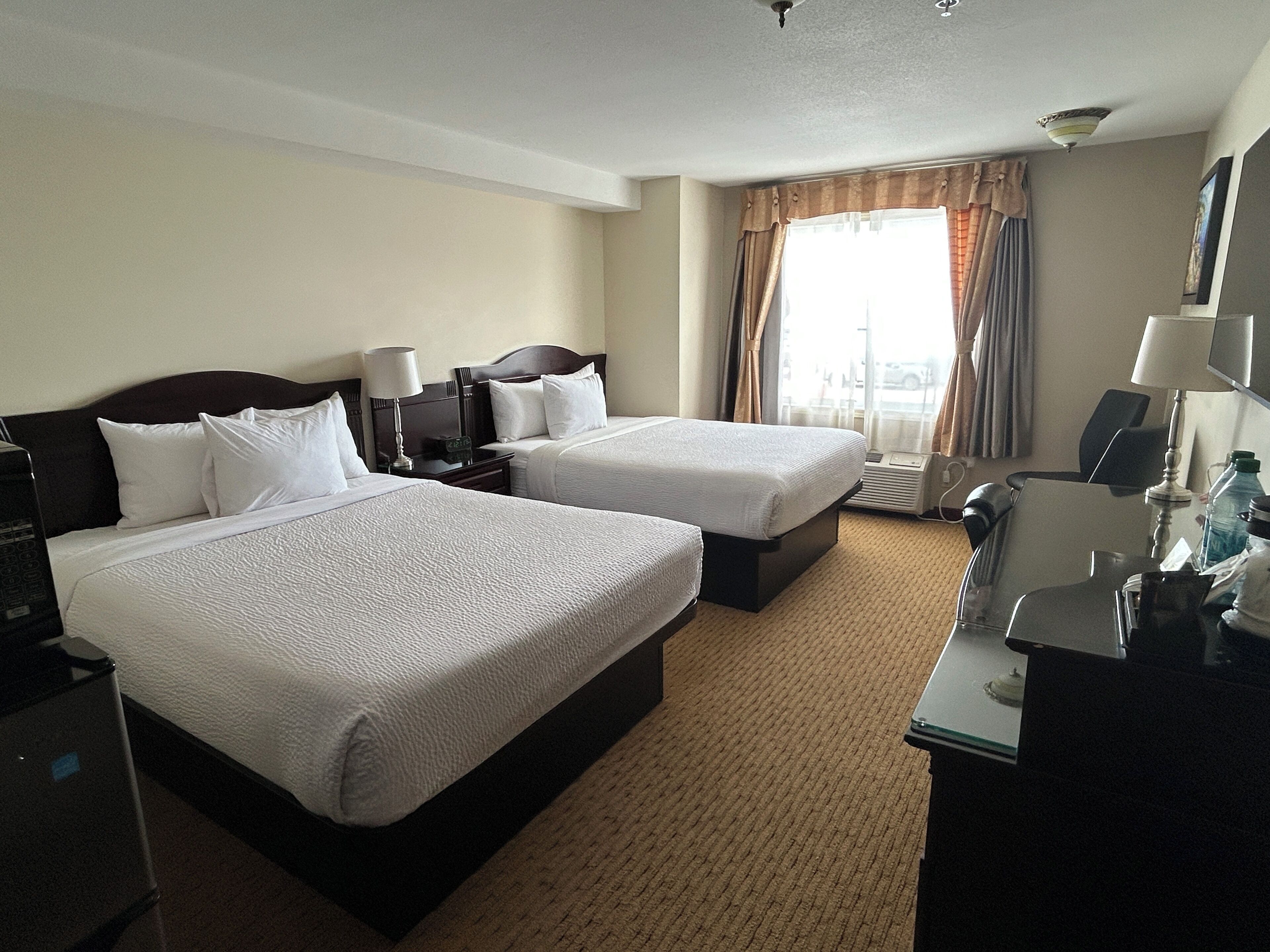 Down comforters, memory foam beds, desk, soundproofing